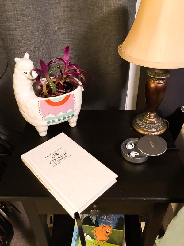 5 minute journal on bedside table