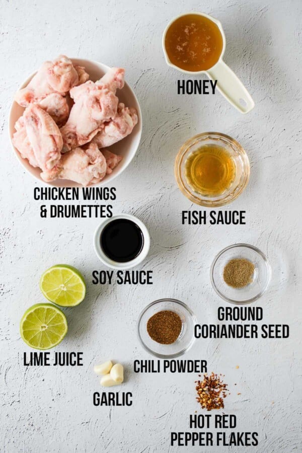 overhead view of ingredients required to make thai glazed chicken wings (labelled)
