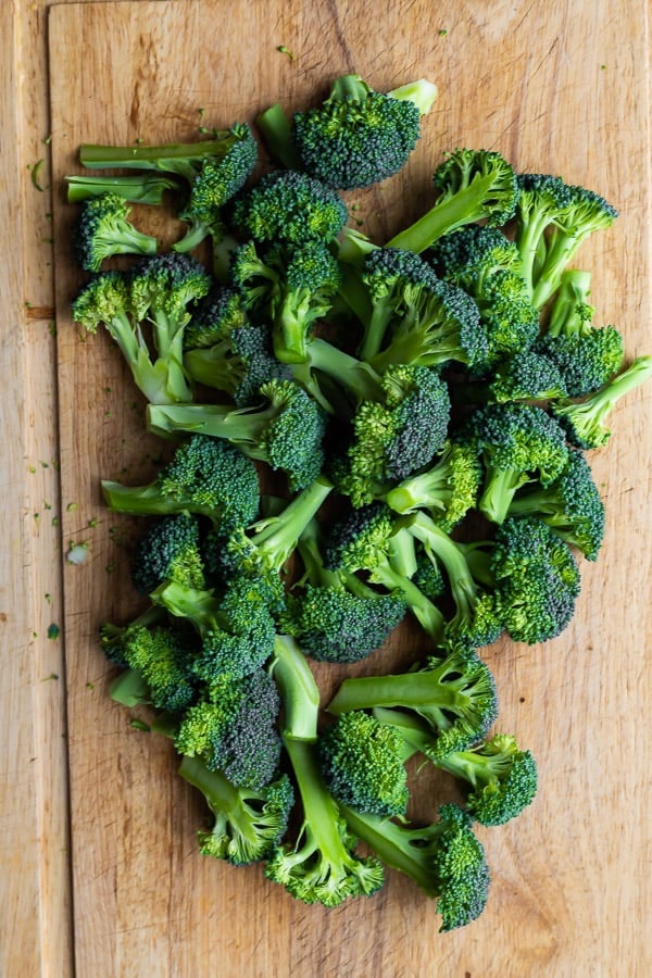 broccoli florets on a cutting board