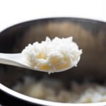 Close up shot of a spoonful of basmati rice coming out of the instant pot