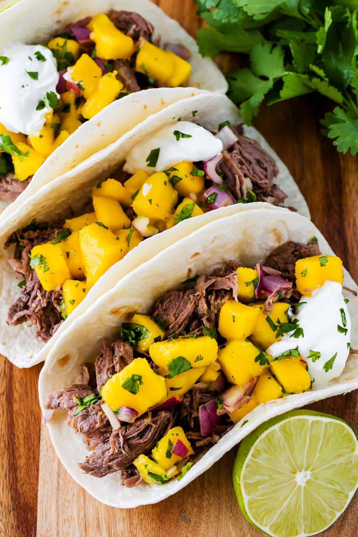 Slow Cooker Jerk-Inspired Beef Tacos with Mango Salsa