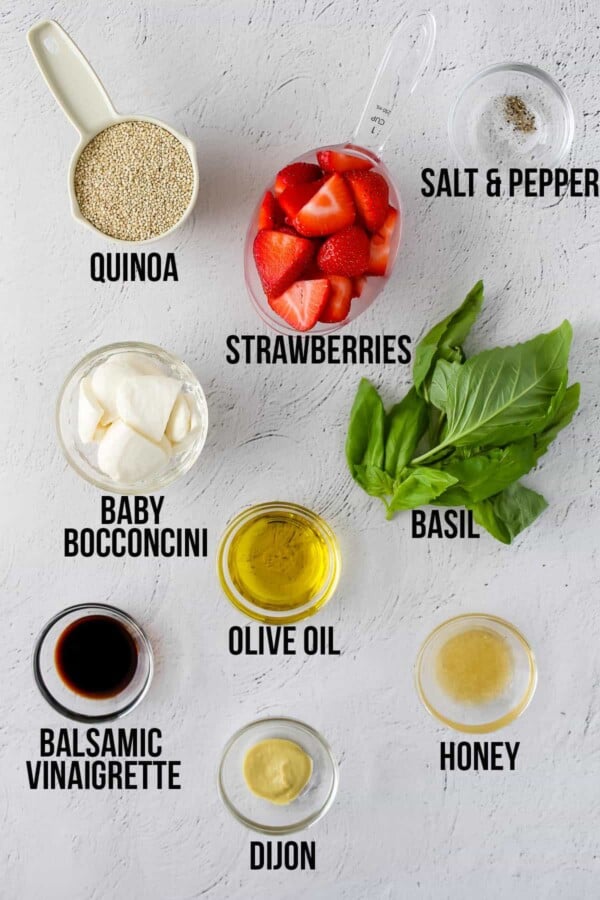 overhead shot of ingredients required to make strawberry caprese quinoa salad