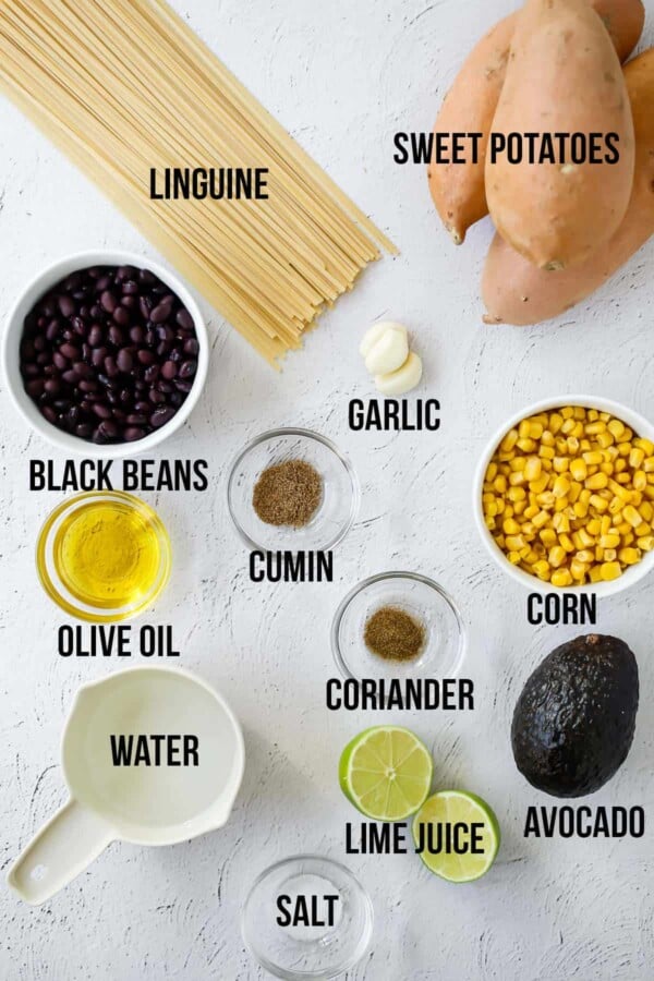 overhead view of ingredients required to make sweet potato noodles with avocado sauce