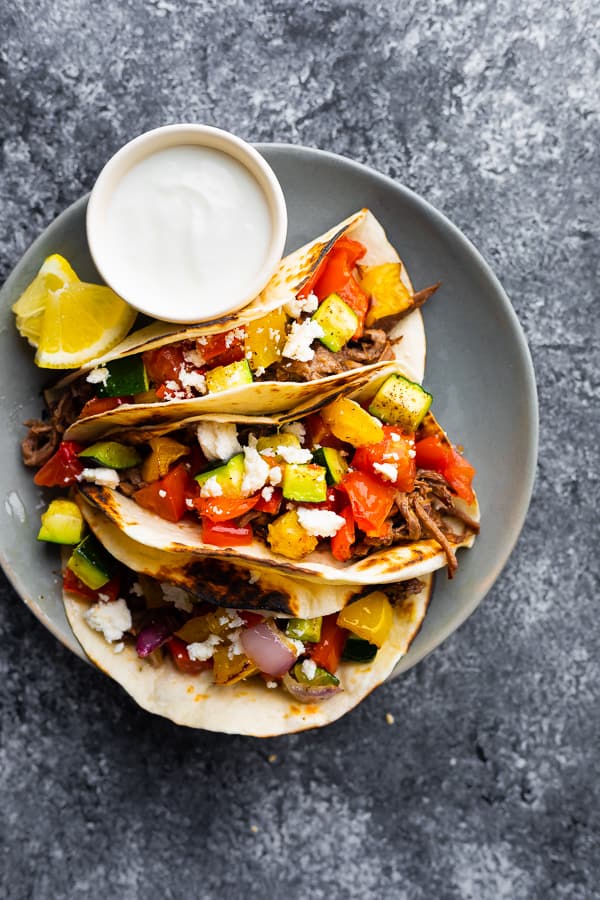 overhead shot of honey garlic beef tacos on plate