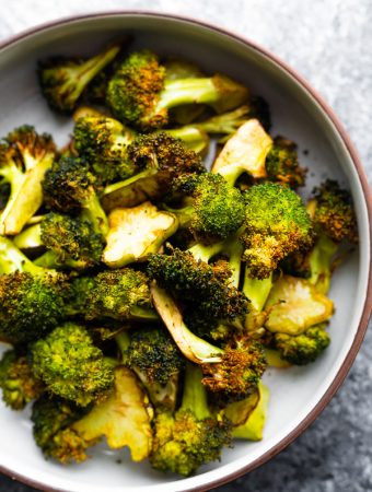 close up shot of air fryer broccoli in a bowl