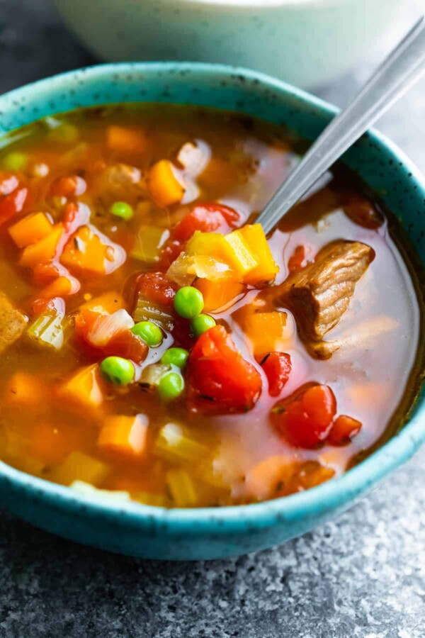 close up shot of a bowl of instant pot vegetable beef soup