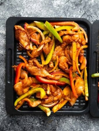 air fryer chicken fajitas on tray before cooking