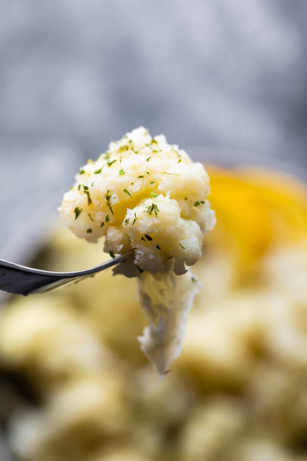 close up shot of cauliflower on fork