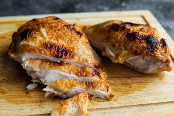 sliced turkey breast on cutting board