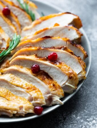 close up shot of sliced instant pot turkey breast on platter