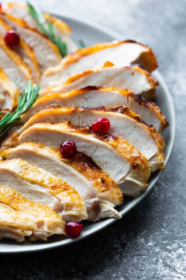 close up shot of sliced instant pot turkey breast on platter