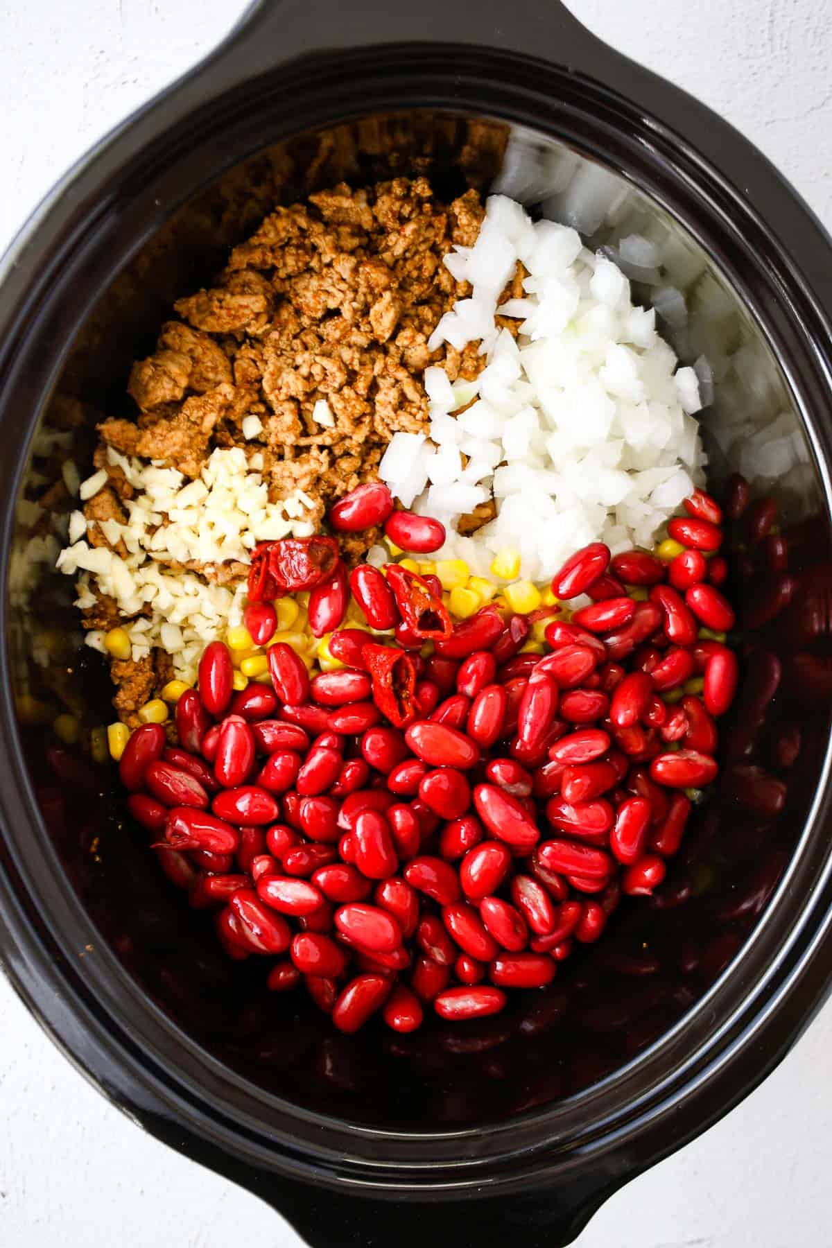 ingredients for slow cooker turkey chili in a slow cooker
