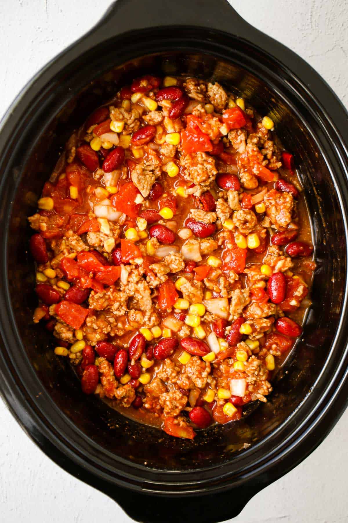 overhead shot of ingredients for a slow cooker turkey chili