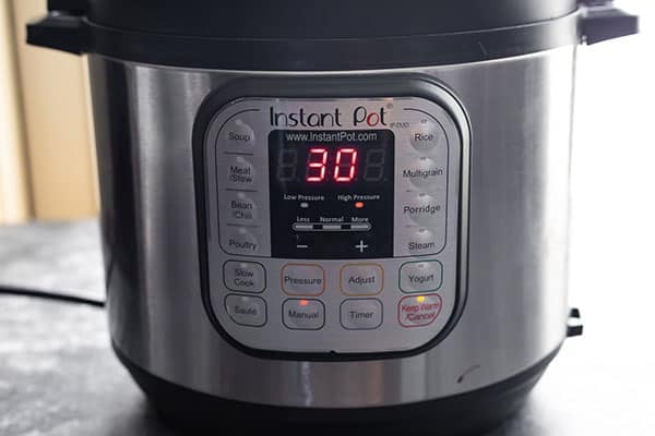 instant pot with screen that says '30'