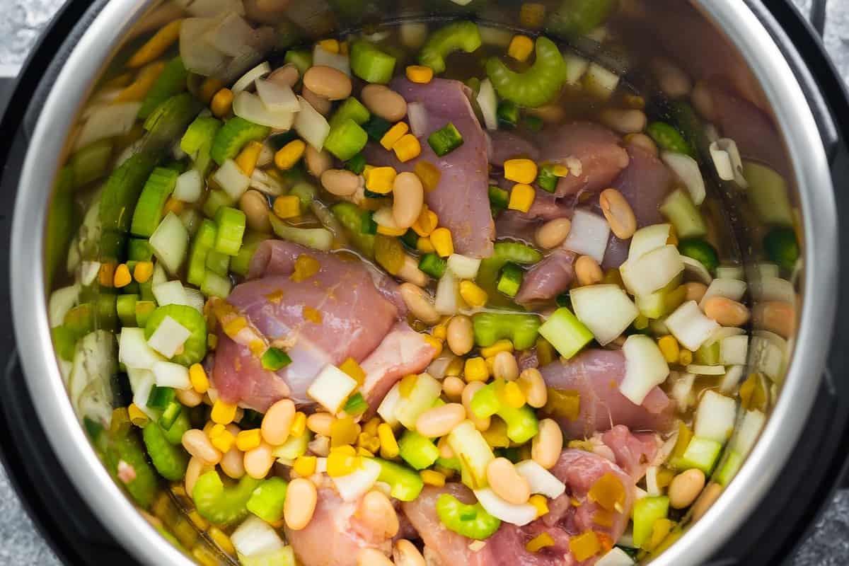 overhead view of white chicken chili in instant pot before cooking