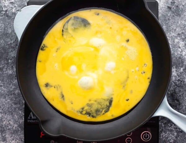 eggs cooking in skillet