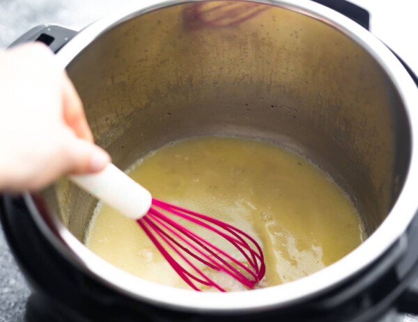 whisking a gravy in the Instant pot