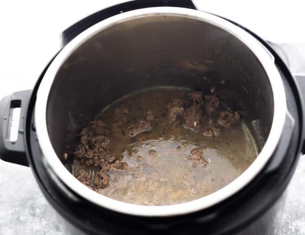 ground beef, seasonings and water in instant pot