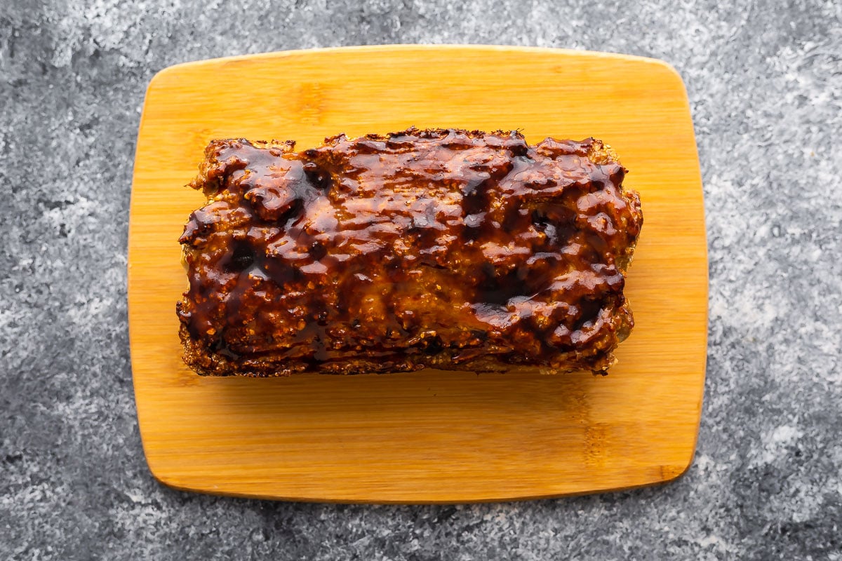 turkey meatloaf brushed with hoisin sauce on cutting board