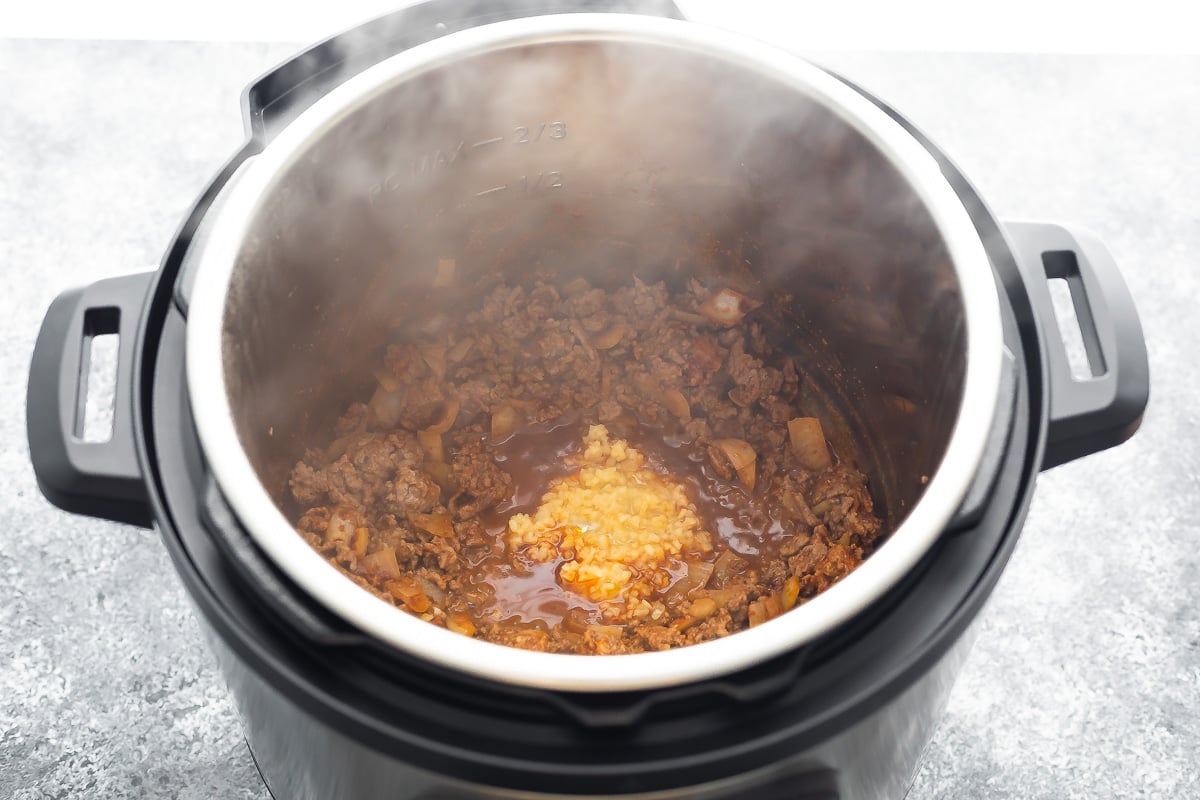 garlic and beef simmering in instant pot