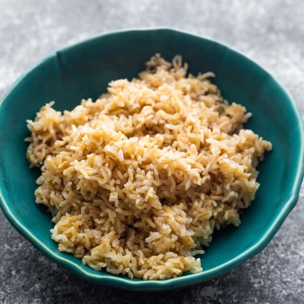 brown rice in blue bowl