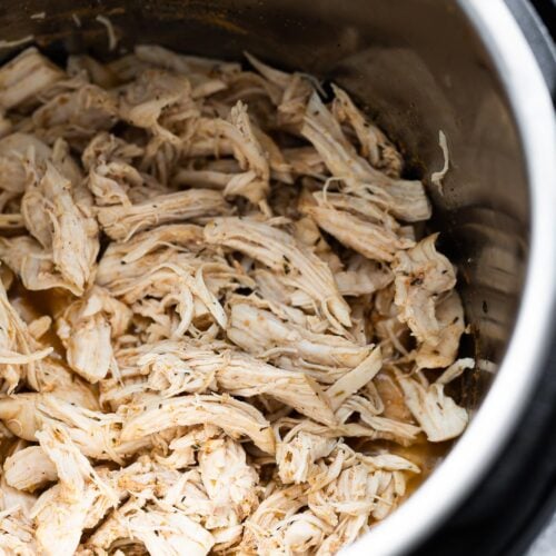 close up shot of shredded chicken in the instant pot