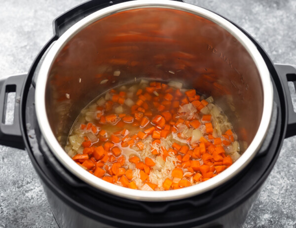 carrots, onions and rice (uncooked) in instant pot