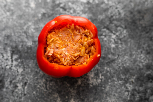 stuffed pepper (uncooked) on grey surface
