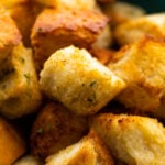 close up shot of air fryer croutons in bowl