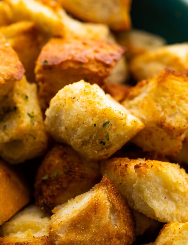 close up shot of air fryer croutons in bowl