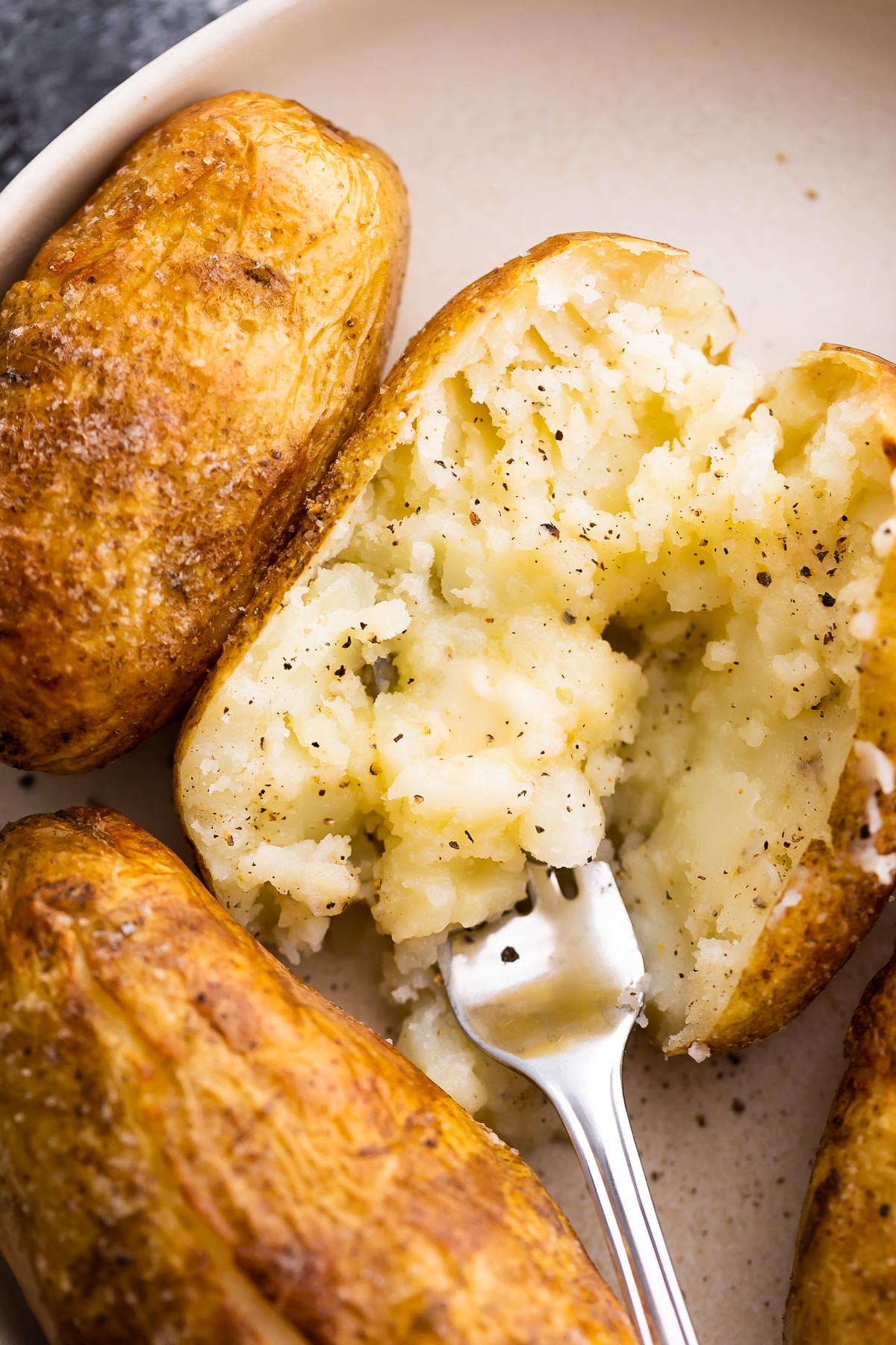 close up view of soft, fluffy insides of baked potato