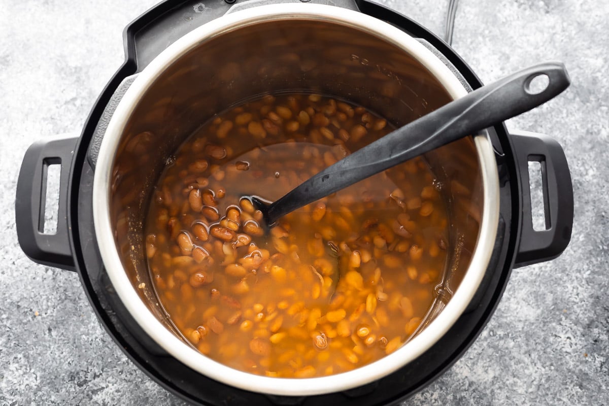 overhead shot of cooked pinto beans in an instant pot