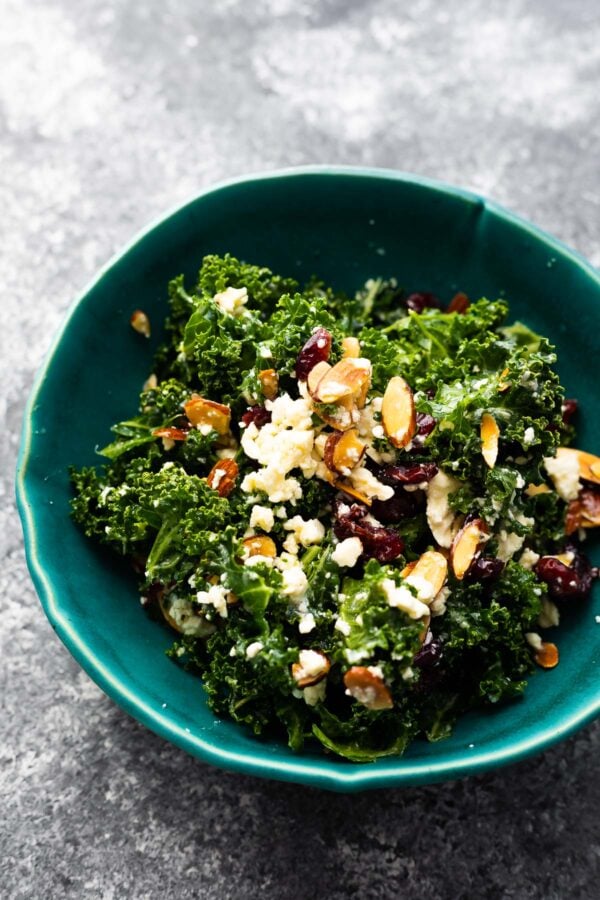 kale salad in blue bowl