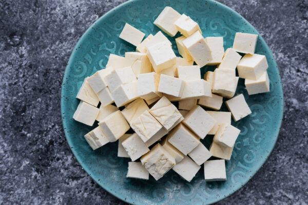 tofu cubes on blue plate
