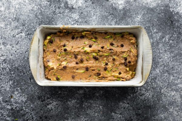 zucchini bread in loaf pan before baking