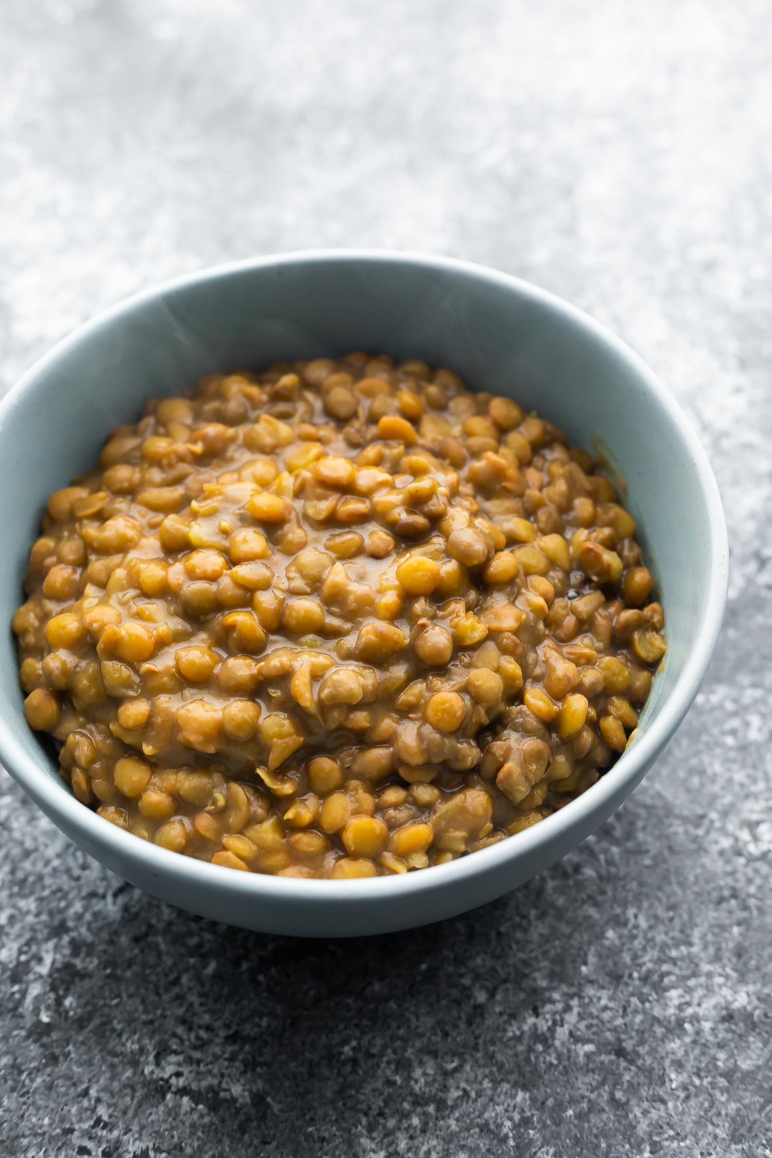 bowl of cooked green lentils