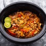close up shot of chicken fajitas in the slow cooker