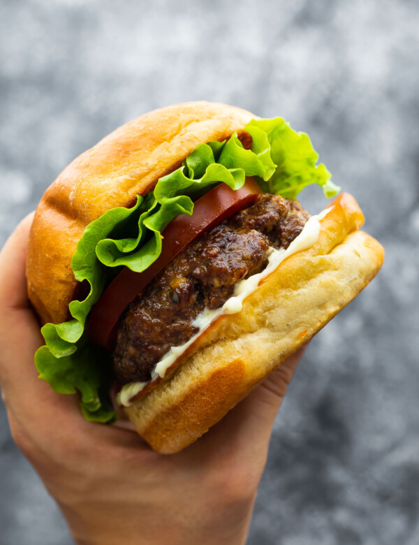 hand holding air fryer burger