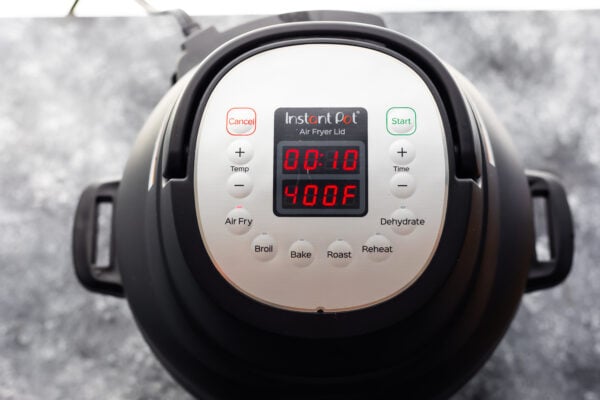 overhead view of instant pot air fryer lid with 10 min on timer