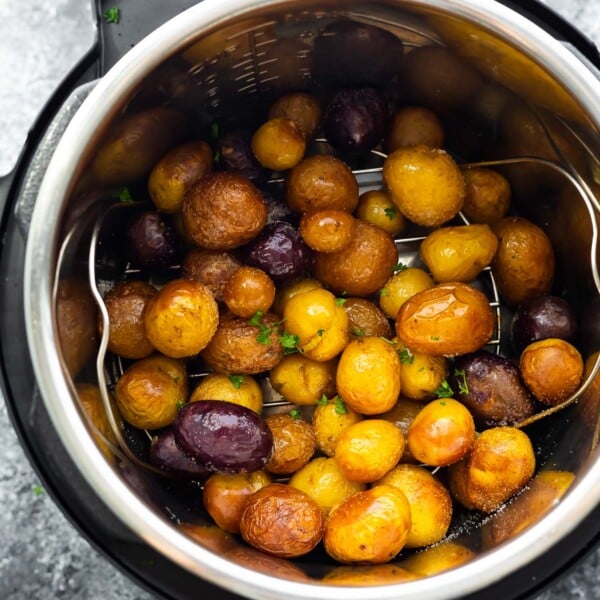 overhead view of baby potatoes in instant pot after cooking and air frying