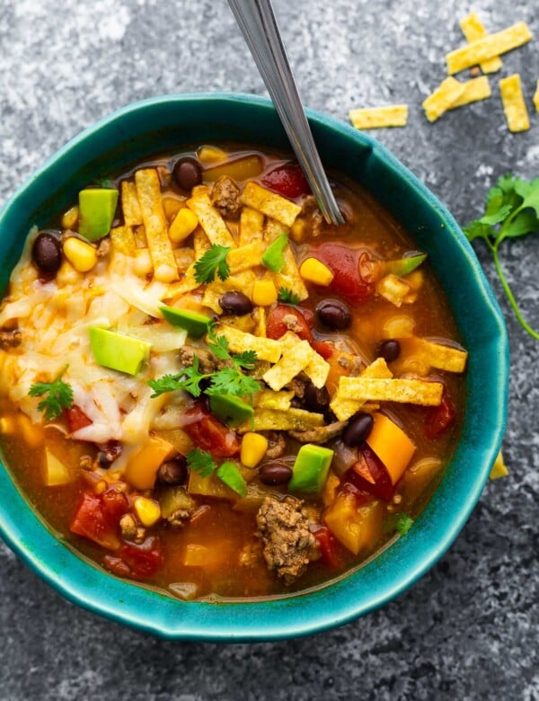 overhead view of bowl of taco soup with spoon