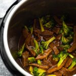 overhead view of beef and broccoli in the instant pot