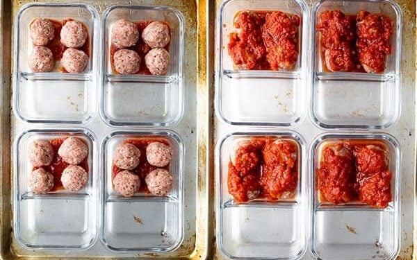 overhead shot of four meal prep containers with marinara sauce and meatballs before baking
