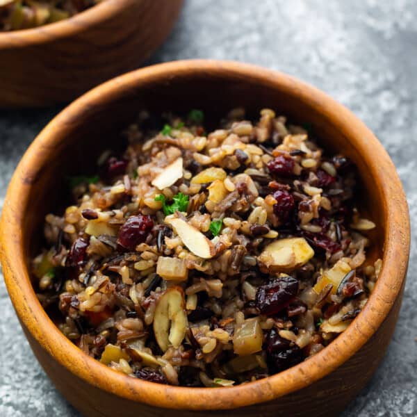 close up view of wild rice pilaf in brown bowl after cooking