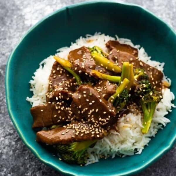 Bowl of beef and broccoli over rice