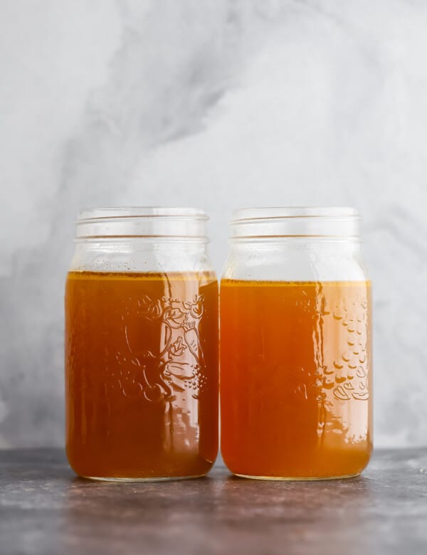 two jars of chicken stock