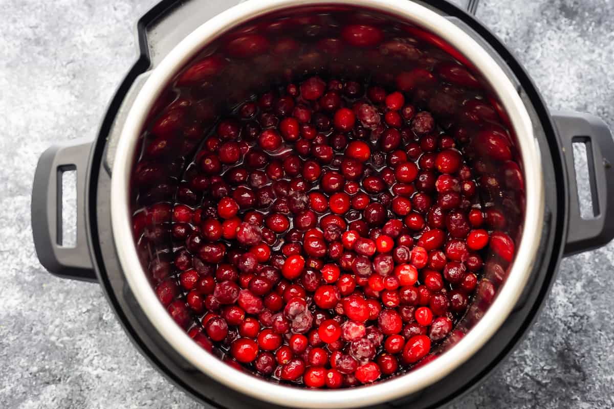 overhead view of instant pot cranberry sauce before cooking