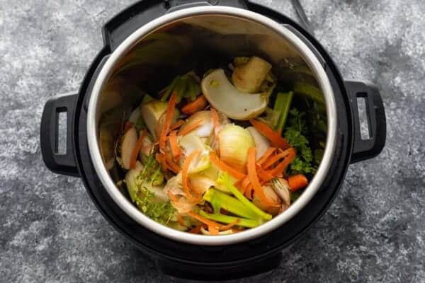 vegetable stock ingredients in instant pot before cooking