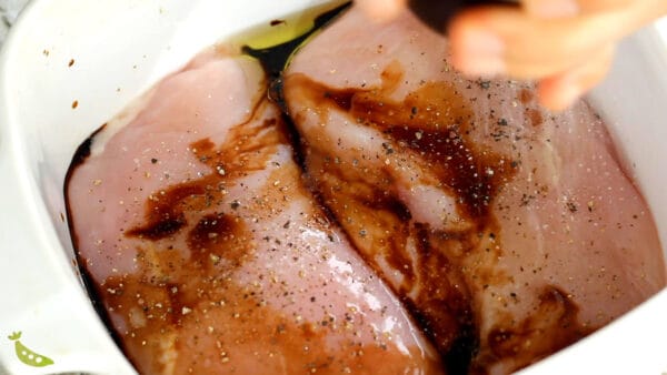 chicken breasts in baking dish before cooking