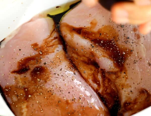 chicken breasts in baking dish before cooking